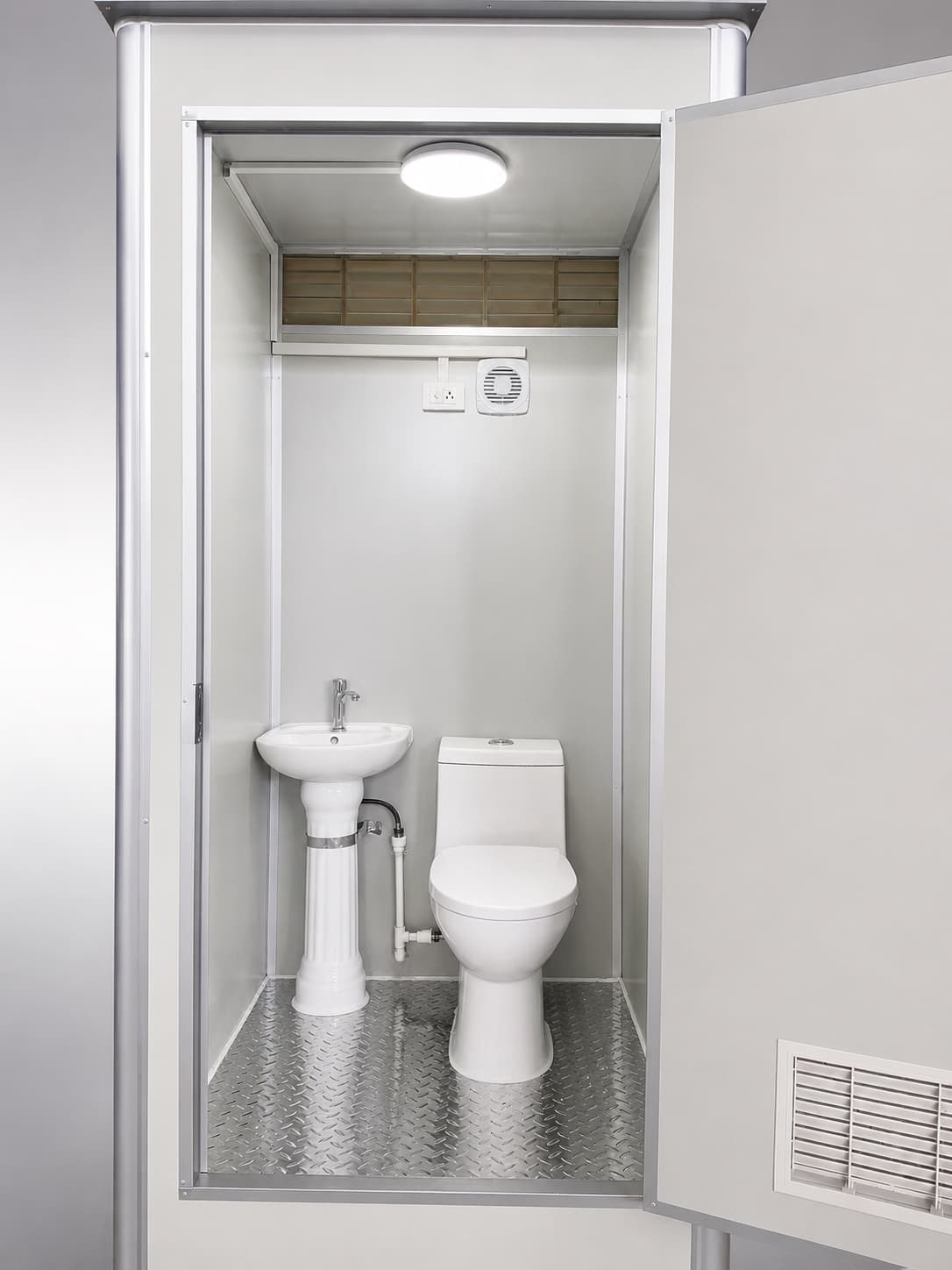 NOVAMOD Essential — interior view with toilet and basin
